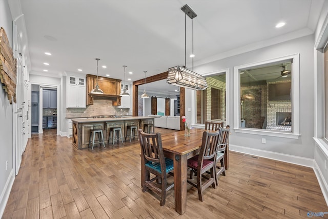 14 Blue Meadow Way, Gurley, AL 35748 - dining room featuring wood finished floors, recessed lighting, baseboards, and ornamental molding