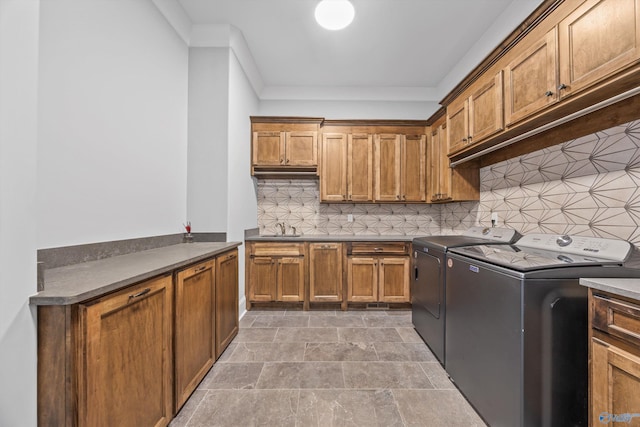 14 Blue Meadow Way, Gurley, AL 35748 - washroom featuring washer and clothes dryer, cabinet space, stone finish floors, and crown molding