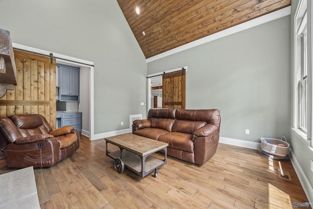 14 Blue Meadow Way, Gurley, AL 35748 - living area with a barn door, wood ceiling, high vaulted ceiling, baseboards, and light wood-style floors