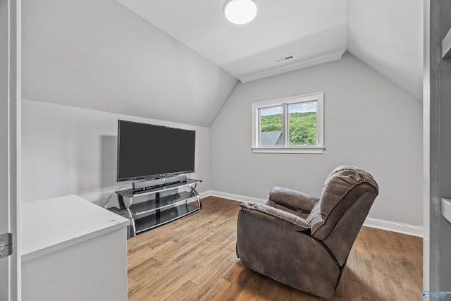 14 Blue Meadow Way, Gurley, AL 35748 - sitting room featuring lofted ceiling, light wood-style flooring, and baseboards