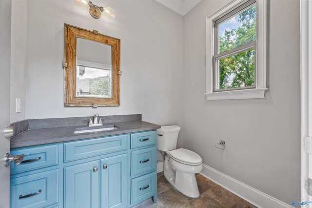 14 Blue Meadow Way, Gurley, AL 35748 - half bathroom featuring toilet, baseboards, and vanity