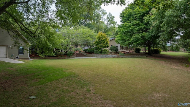 view of yard featuring a garage