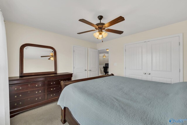 carpeted bedroom with ceiling fan