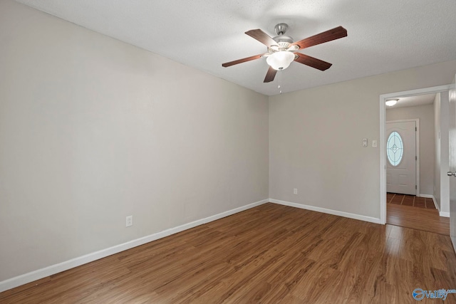 702 Royce Cir SE, Huntsville, AL 35803 - unfurnished room with wood finished floors and ceiling fan