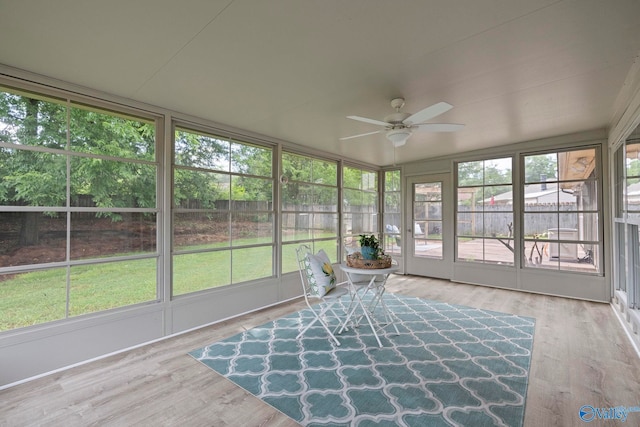 702 Royce Cir SE, Huntsville, AL 35803 - unfurnished sunroom with a ceiling fan