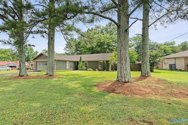 702 Royce Cir SE, Huntsville, AL 35803 - view of front of property featuring a garage and a front yard
