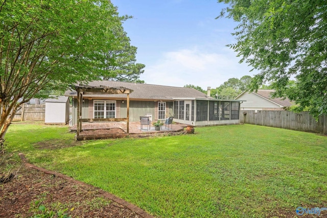 702 Royce Cir SE, Huntsville, AL 35803 - rear view of property featuring a sunroom, a pergola, a patio, and a fenced backyard