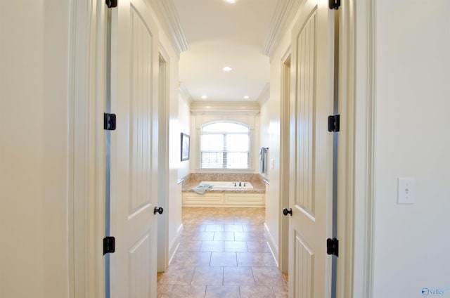 corridor with light tile patterned floors, recessed lighting, and ornamental molding