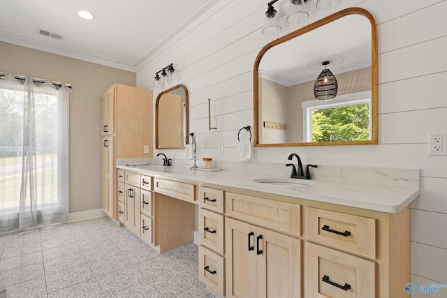 bathroom featuring crown molding, tile patterned flooring, vanity, and wooden walls