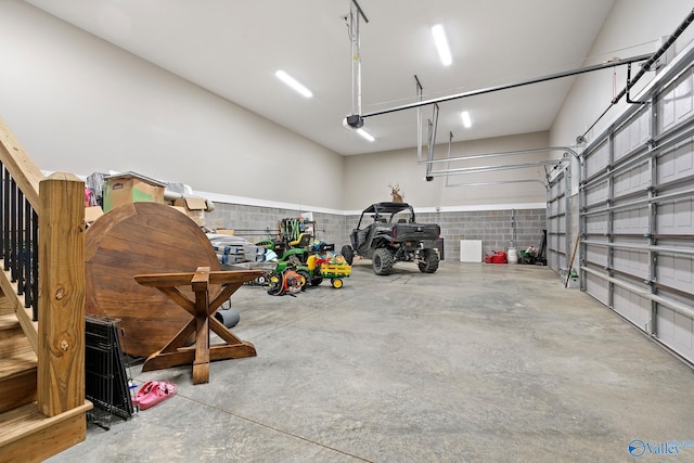 garage featuring a garage door opener