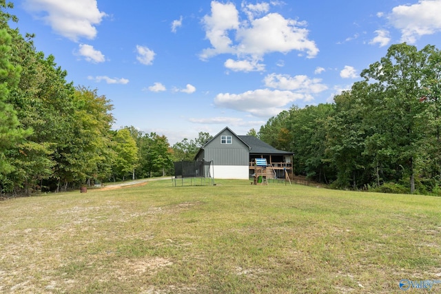 view of yard featuring a trampoline