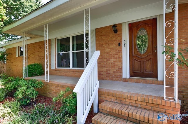 property entrance with a porch