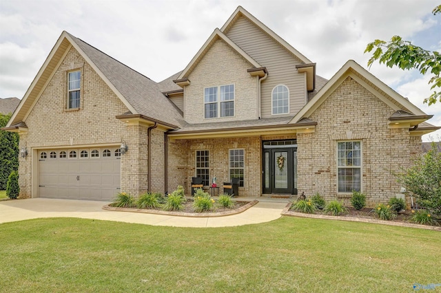17092 Obsidian Cir, Athens, AL 35613 - view of front of house with a garage, driveway, a front lawn, brick siding, and roof with shingles