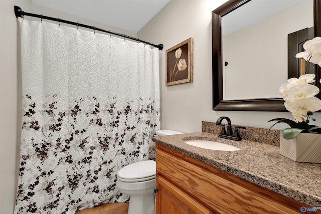 17092 Obsidian Cir, Athens, AL 35613 - bathroom featuring toilet, vanity, and a shower with curtain