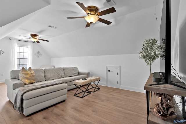 17092 Obsidian Cir, Athens, AL 35613 - living room with ceiling fan, light wood-style floors, lofted ceiling, and baseboards