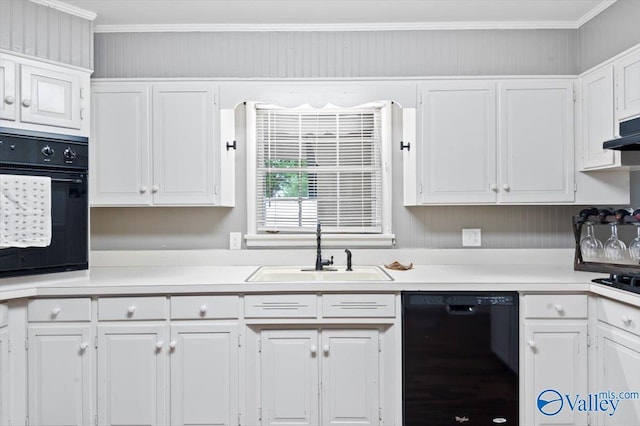 kitchen featuring a sink, white cabinets, black appliances, and light countertops