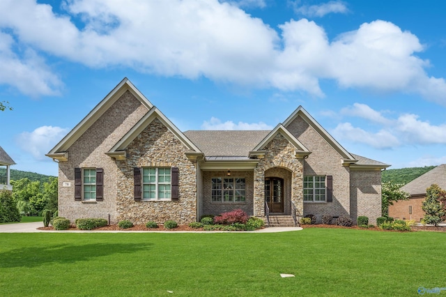 78 Mcmullen Ln SE, Gurley, AL 35748 - view of front of home featuring a front lawn, brick siding, and stone siding