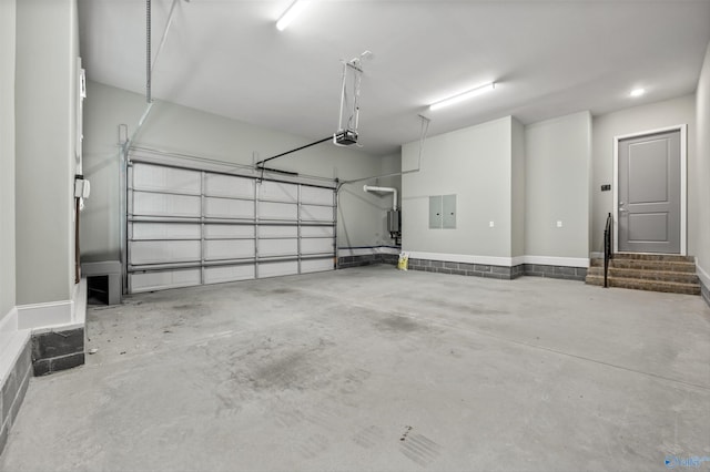 78 Mcmullen Ln SE, Gurley, AL 35748 - garage featuring a garage door opener and electric panel