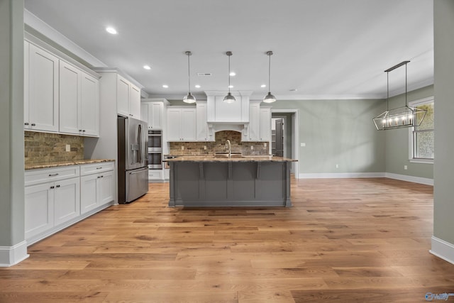 78 Mcmullen Ln SE, Gurley, AL 35748 - kitchen featuring appliances with stainless steel finishes, ornamental molding, baseboards, backsplash, and recessed lighting