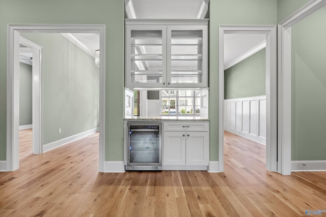 78 Mcmullen Ln SE, Gurley, AL 35748 - indoor bar with beverage cooler, light wood-type flooring, and baseboards