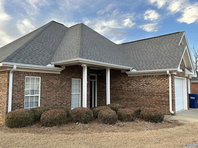 view of side of property with a garage