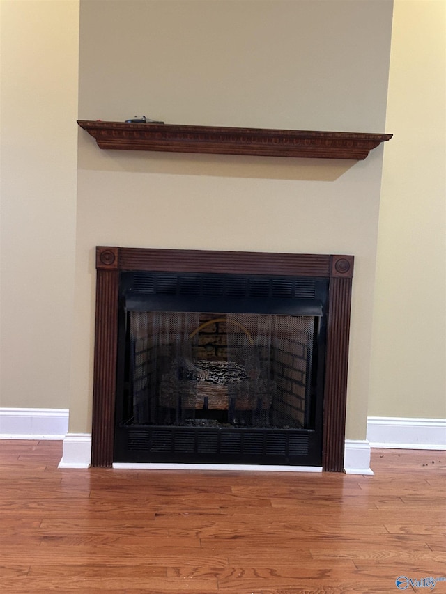 interior details featuring hardwood / wood-style floors