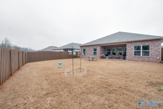 view of yard featuring a fenced backyard