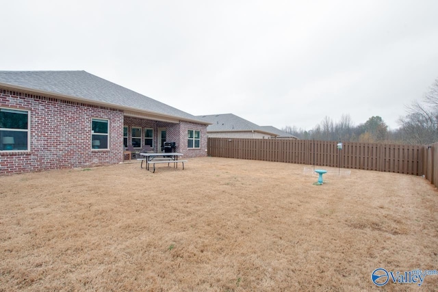 view of yard featuring a fenced backyard