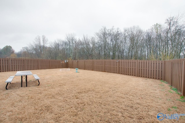 view of yard featuring a fenced backyard