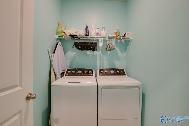 laundry room featuring laundry area and washing machine and dryer