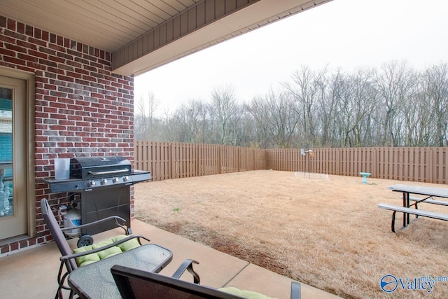 view of patio featuring grilling area and a fenced backyard