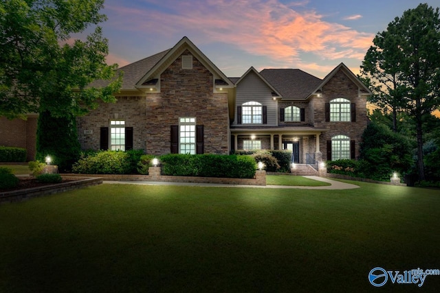 view of front facade with a yard