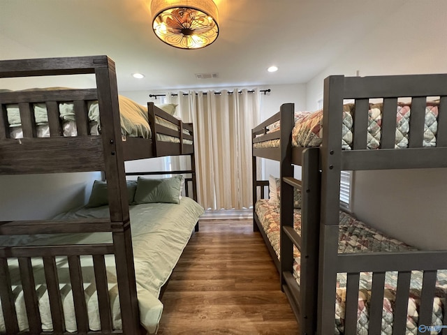 bedroom featuring dark hardwood / wood-style floors