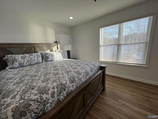 bedroom featuring dark hardwood / wood-style floors