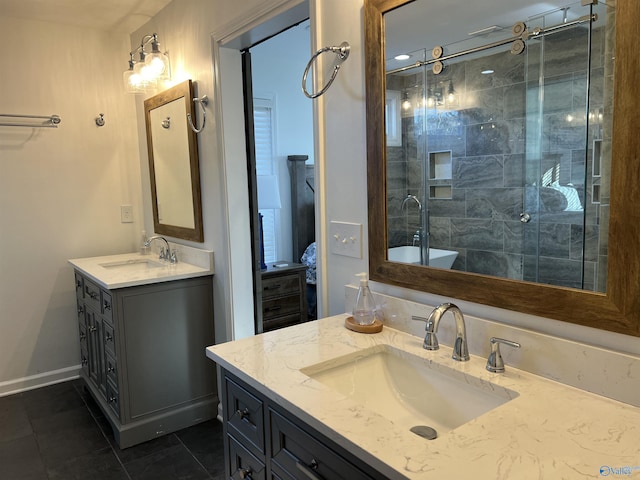 bathroom with tile patterned floors, vanity, and an enclosed shower