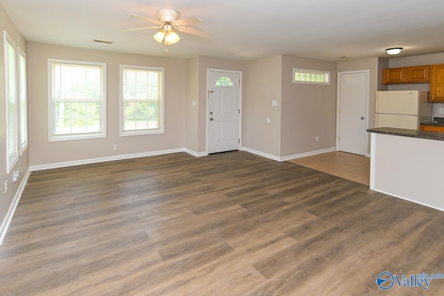 4114 Triana Blvd, Huntsville, AL 35802 - unfurnished living room with ceiling fan and dark wood-style floors