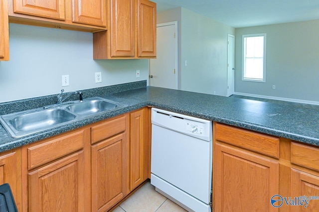 4114 Triana Blvd, Huntsville, AL 35802 - kitchen with dishwasher, dark countertops, and light tile patterned floors