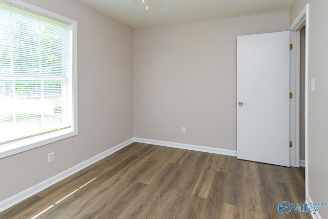 4114 Triana Blvd, Huntsville, AL 35802 - spare room featuring plenty of natural light and wood finished floors