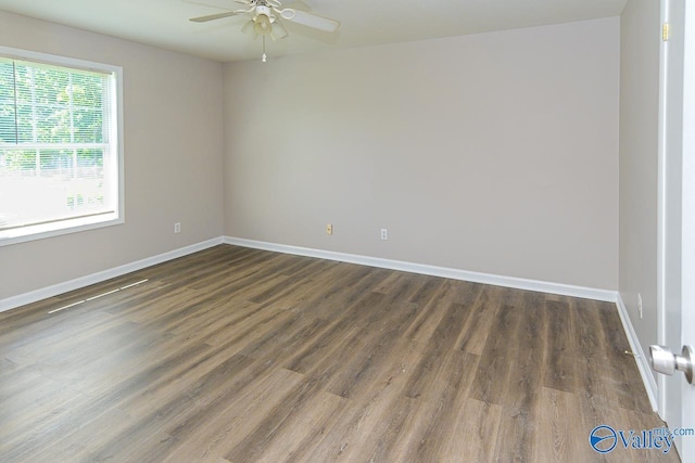 4114 Triana Blvd, Huntsville, AL 35802 - empty room with ceiling fan and dark wood-style flooring