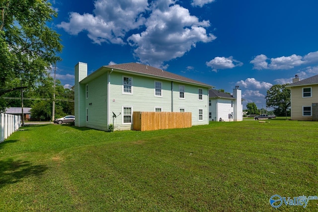 4114 Triana Blvd, Huntsville, AL 35802 - rear view of property with a chimney