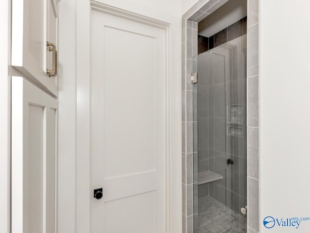 bathroom featuring walk in shower