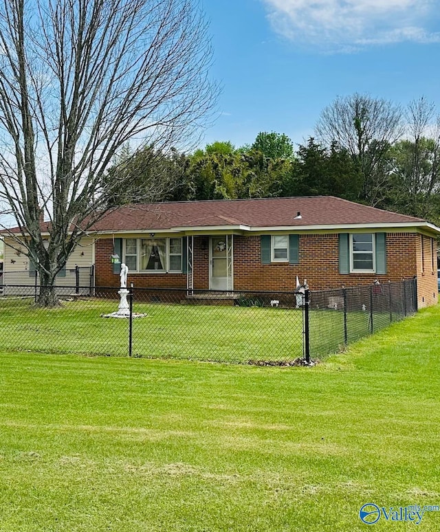 26740 Nick Davis Rd, Athens, AL 35613 - ranch-style home featuring brick siding, a front lawn, and a fenced front yard