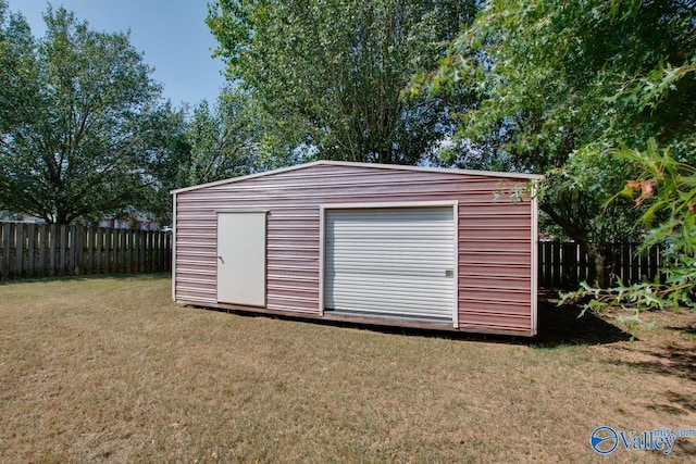 view of shed featuring a fenced backyard