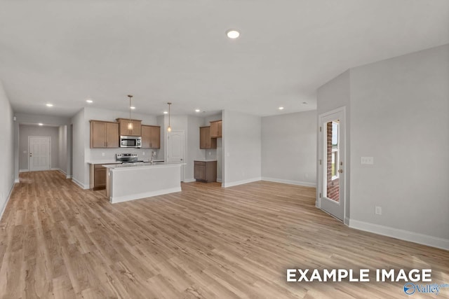 297 Keller Dr, Hazel Green, AL 35750 - kitchen with light wood-style flooring, stainless steel appliances, and recessed lighting