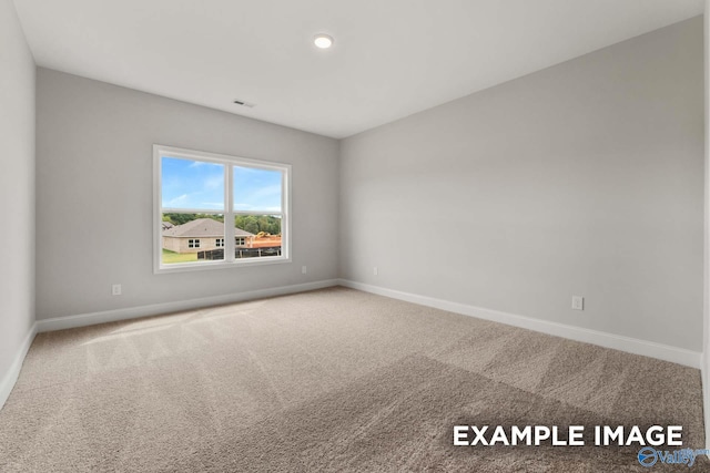 297 Keller Dr, Hazel Green, AL 35750 - carpeted empty room with visible vents and baseboards
