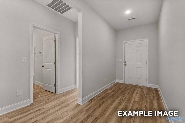 297 Keller Dr, Hazel Green, AL 35750 - interior space with visible vents, baseboards, and wood finished floors