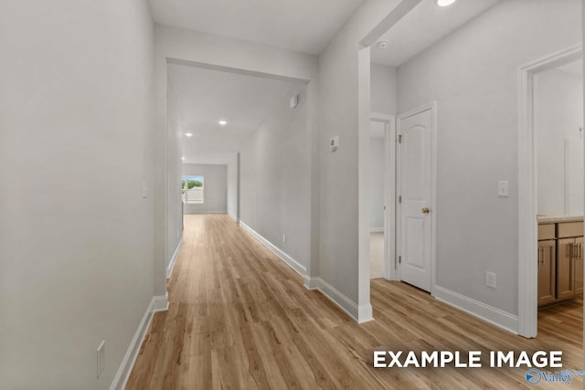 297 Keller Dr, Hazel Green, AL 35750 - hallway featuring light wood finished floors and baseboards
