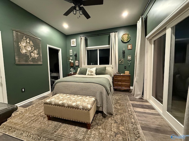 bedroom featuring ceiling fan and dark hardwood / wood-style floors