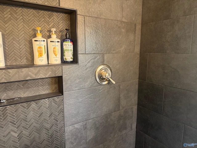 details with a tile shower