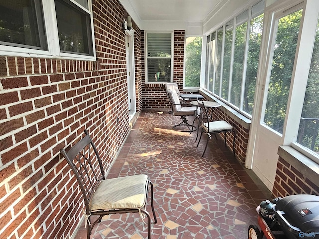 sunroom / solarium with a wealth of natural light